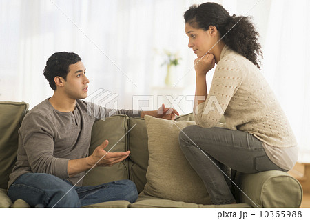 Couple talking on sofa Couple talking on sofa 10365988