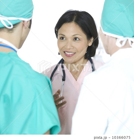 Medical team conferring Medical team conferring 10366075