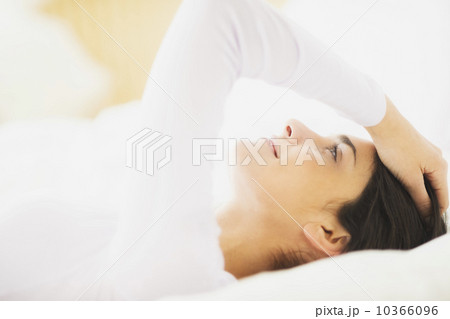 Woman lying in bed 10366096