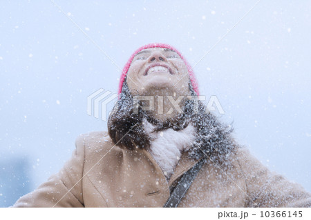 Woman in snowfall Woman in snowfall 10366145