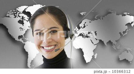 Woman with headset with world map in background 10366312