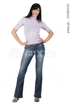 Woman standing with hands on her hips 10366342
