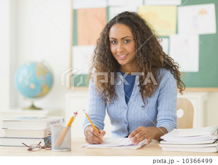 Portrait of elementary school teacher in class 10366499