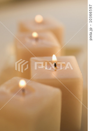 A group of lighted candles 10366597