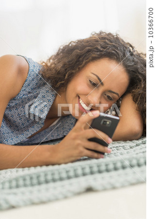 Young woman using smartphone 10366700