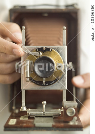 Using an antique folding camera 10366860