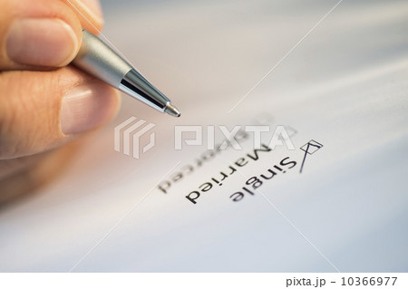 Close-up of hand filling out form Close-up of hand filling out form 10366977