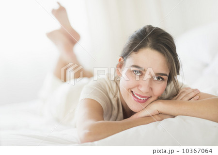 Woman lying in bed  10367064