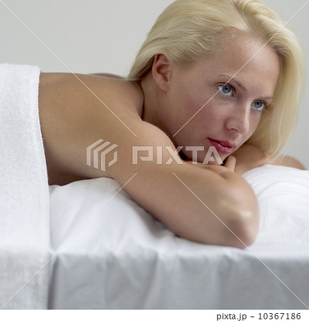 Young woman on a masseuse table Young woman on a masseuse table 10367186