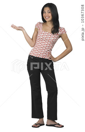 A woman gesturing with her hand 10367308