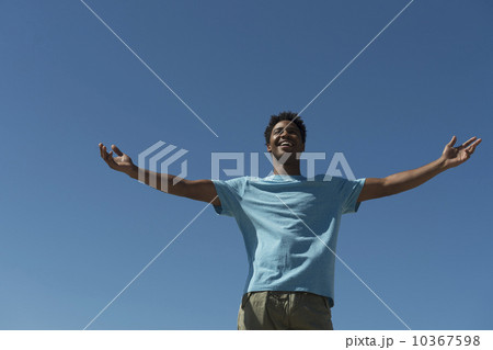 Happy man against clear sky Happy man against clear sky 10367598