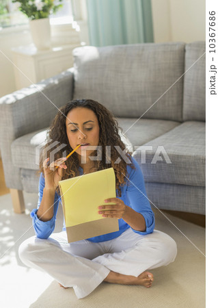 Young woman dealing with home finance 10367686