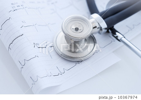 Closeup of stethoscope on monitor printout 10367974
