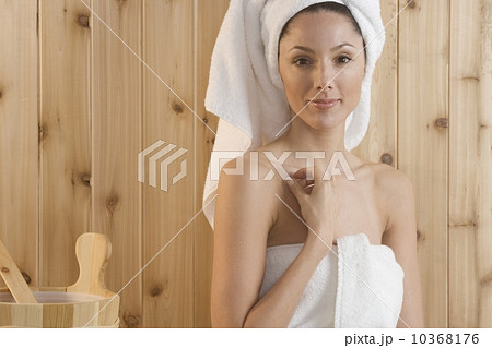 Smiling woman in sauna Smiling woman in sauna 10368176