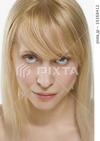 Blond woman looking up intensely 10368412