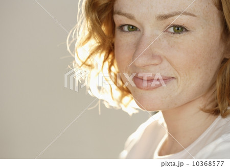 Portrait of smiling redheaded woman 10368577