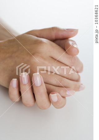 Woman with clasped hands 10368621