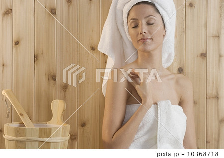 Woman relaxing in sauna 10368718