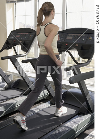 Woman working out on treadmill 10368723