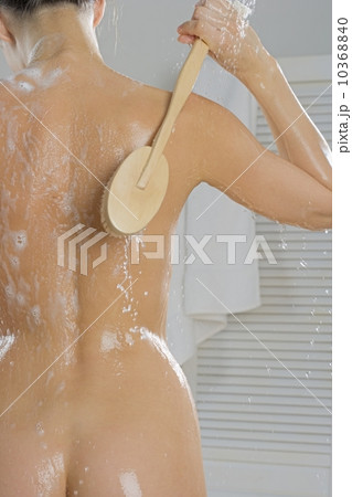 Rear view of woman bathing 10368840