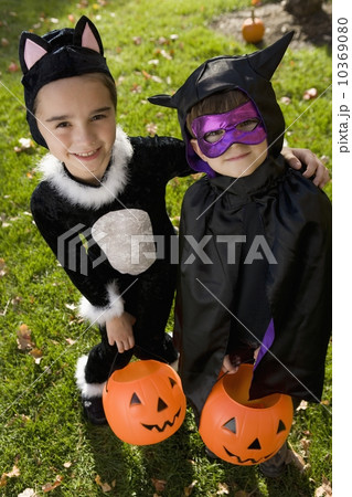 Boy and girl in Halloween costumes Boy and girl in Halloween costumes 10369080