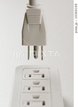 Still life of plug and outlet 10369109
