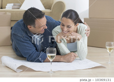 Couple looking at blueprints Couple looking at blueprints 10369131
