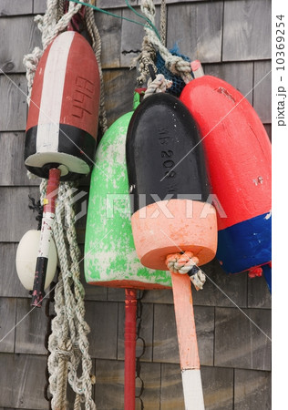 Buoys on a wall in Maine 10369254