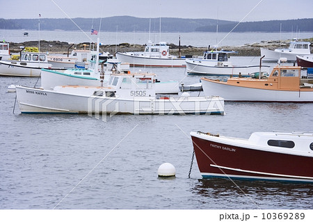 Lobster boats in a Maine harbor Lobster boats in a Maine harbor 10369289