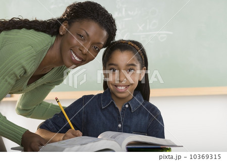 Female teacher and student 10369315