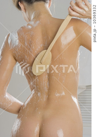 Rear view of woman bathing 10369332