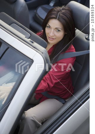 Woman driving a car Woman driving a car 10369334
