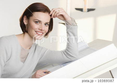 Portrait of woman at drawing board 10369387