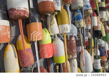 Colorful buoys hanging against wall 10369403