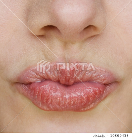 Close up of puckered lips Close up of puckered lips 10369453