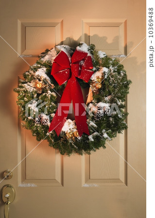 Still life of Christmas wreath on door 10369488