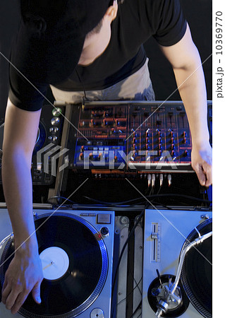 Man mixing music in a nightclub 10369770