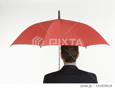 Man holding an umbrella Man holding an umbrella 10369818