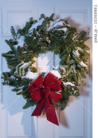 Still life of Christmas wreath on door 10369861