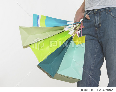 Woman holding shopping bags 10369862