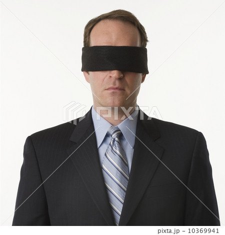 Man wearing blindfold Man wearing blindfold 10369941