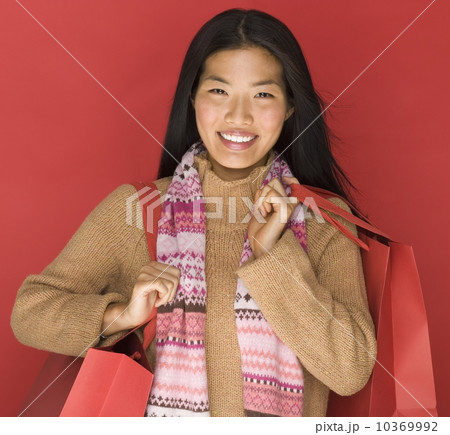 Young woman with shopping bags 10369992