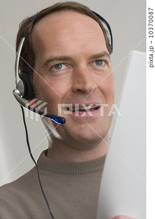 Man wearing headset Man wearing headset 10370087