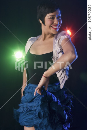 Woman dancing at nightclub Woman dancing at nightclub 10370089