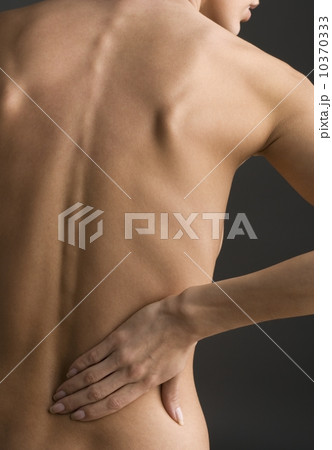 Woman with aching back Woman with aching back 10370333