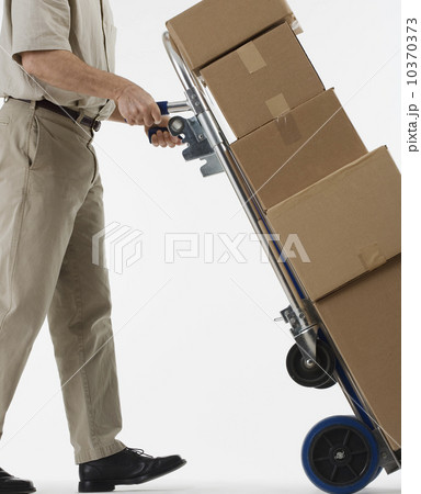 Delivery man with packages Delivery man with packages 10370373