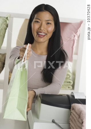 Portrait of a female sales person Portrait of a female sales person 10370428