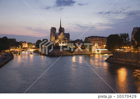 Scenic view of cathedral next to water at night Scenic view of cathedral next to water at night 10370429