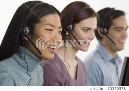 Phone operators using headsets Phone operators using headsets 10370578