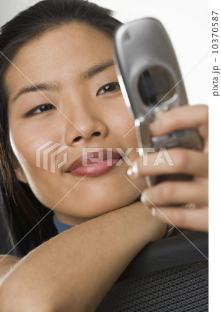Young woman using a mobile phone 10370587